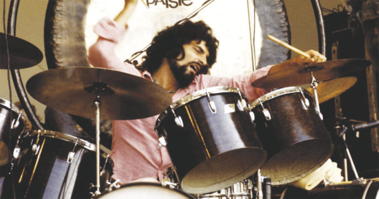 A bearded Carmine Appice Performing with Vanilla Fudge