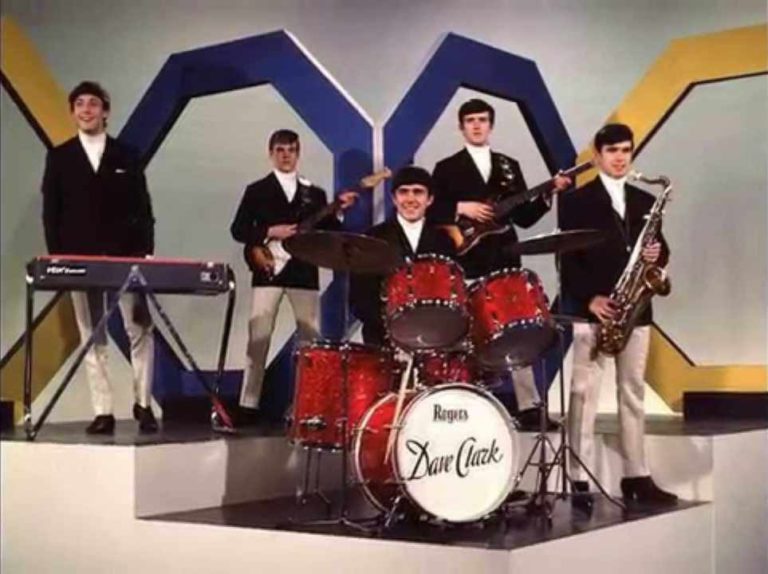 Dave Clark Five in suits on the set of a TV studio