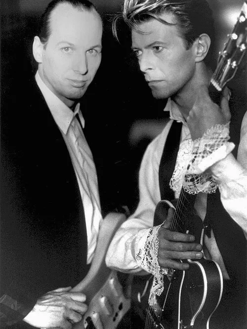 Belew and Bowie in black and white