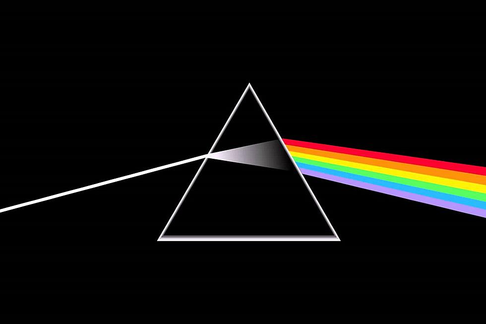 Dark Side of the Moon album cover with black background and beam of light going into prism and coming out in a rainbow