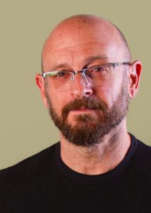 Head shot of the author Shannon Duncan in black t-shirt