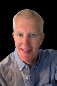 Photo of Randal Hansen in collared shirt