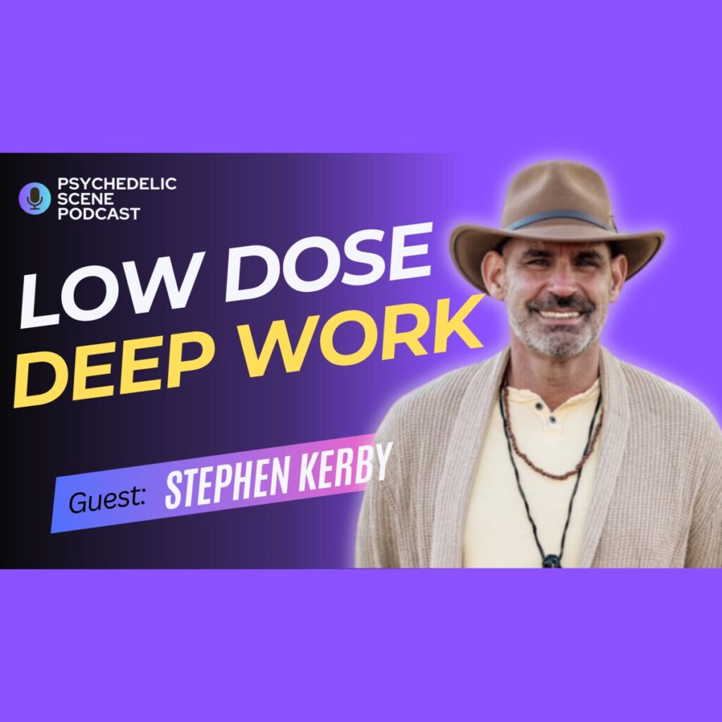 Man in grey sweater over white t-shirt with Indiana Jones-style hat and necklaces