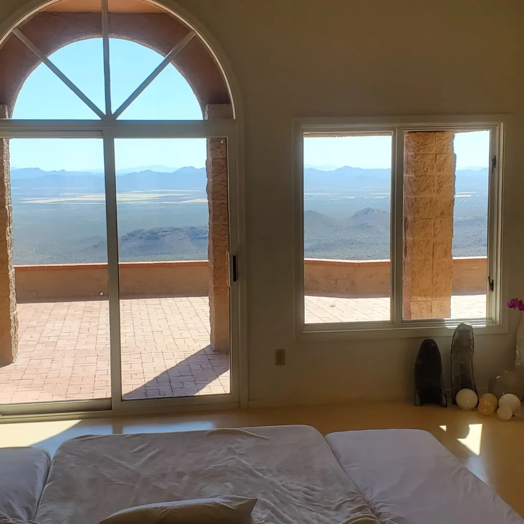 Room with arched window overlooking the desert west of Tucson