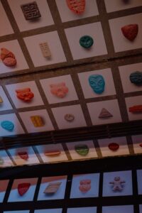 Rows of multi-colored tablets in white frames