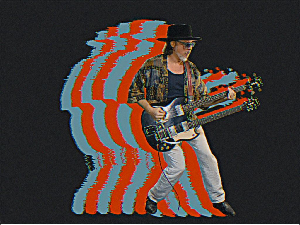 Image of Scott Holiday playing guitar with red and blue outlines behind the photo